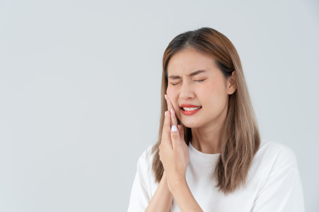Asian woman feel toothache from gingivitis, female suffer tooth, decay problems, dental care. sensitive tooth, decay problem, bad breath, Gingival Recession, Oral Hygiene instruction, tooth extraction